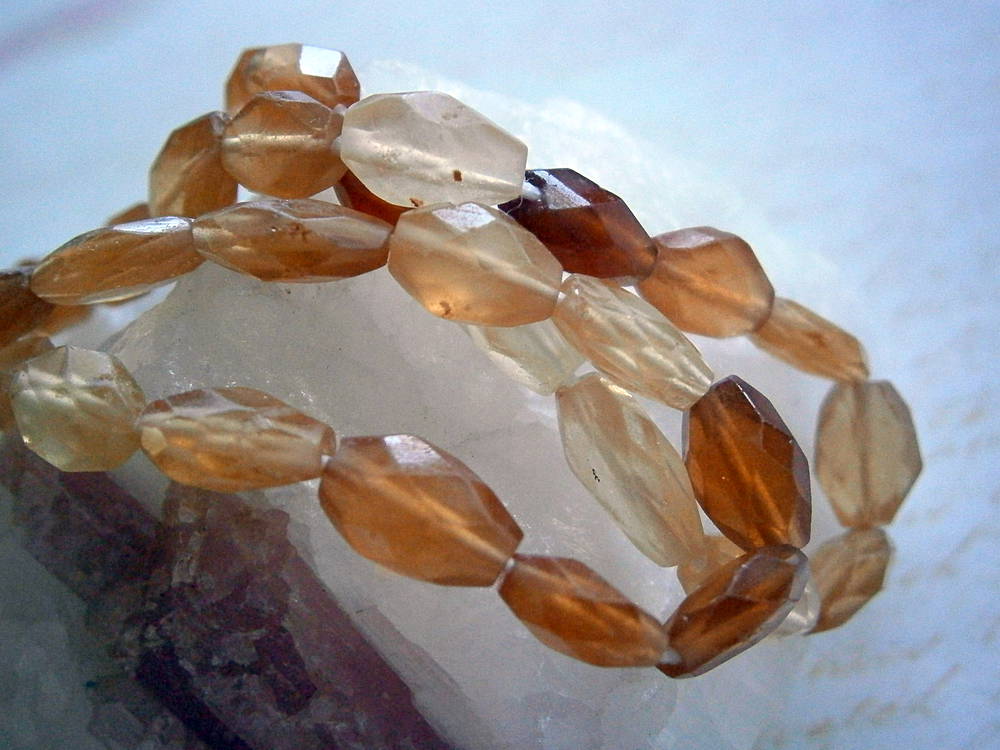 Granát hessonit QAA fazetovaný 6 x 9 mm
