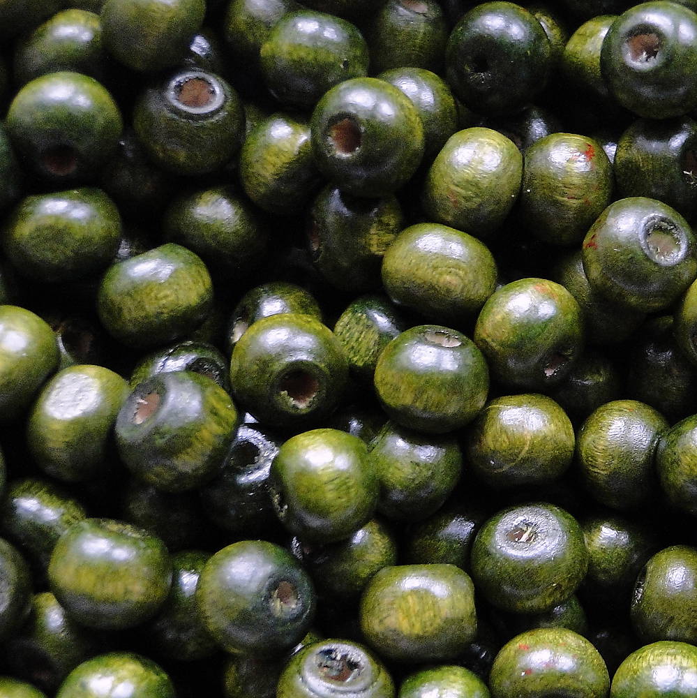 Drevené korálky 7x8mm-50ks (tm.zelená)