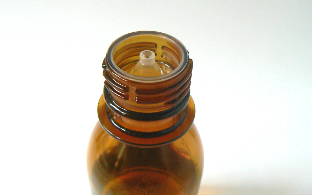 Masážny olej škoricovo-pomarančový (100 ml)